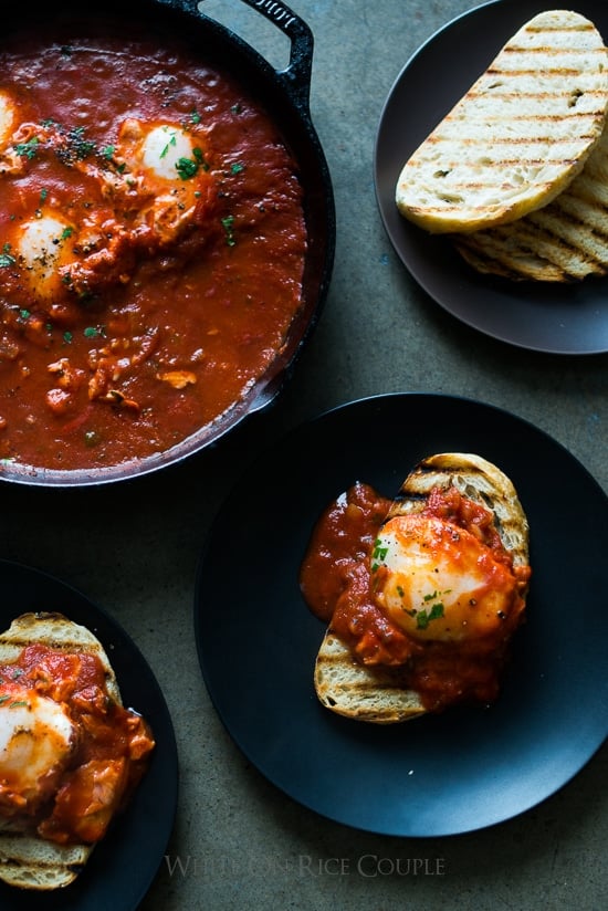 Poached Eggs in Tomato Sauce Shakshuka or Shakshouka toast on a plate