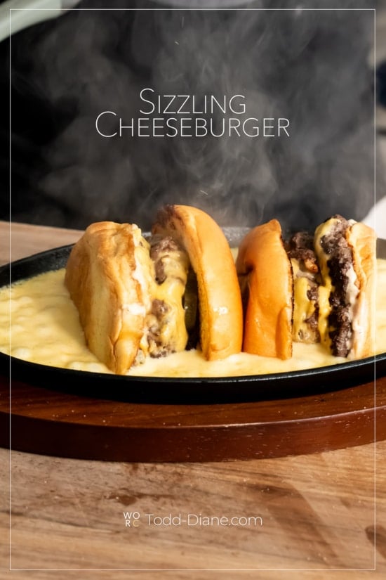 hot sizzling cheeseburgers in sauce