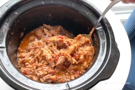 Finished pulled pork in the slow cooker