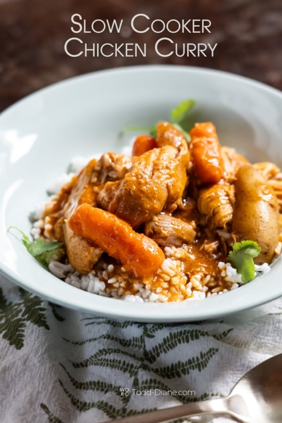 bowl of slow cooker chicken curry on white rice 