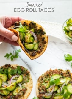 holding a smash egg roll taco recipe
