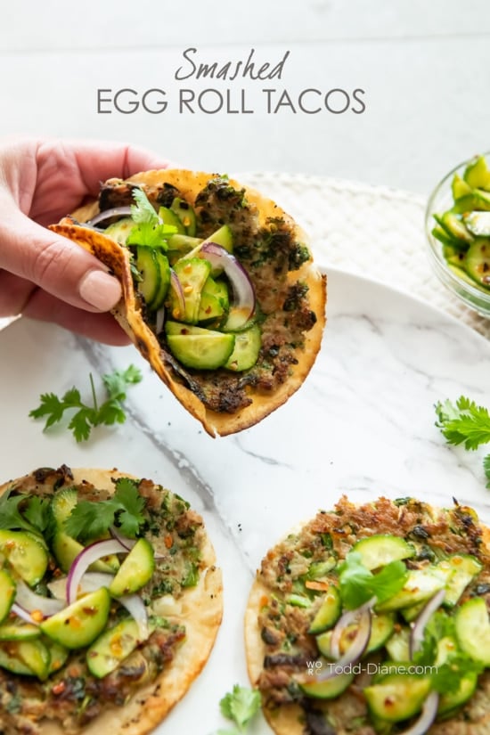 holding a smash egg roll taco recipe