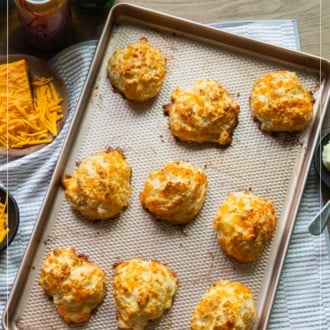 sparkling water cheddar drop biscuits on sheet pan