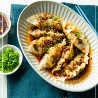 bowl of spicy wontons in sauce