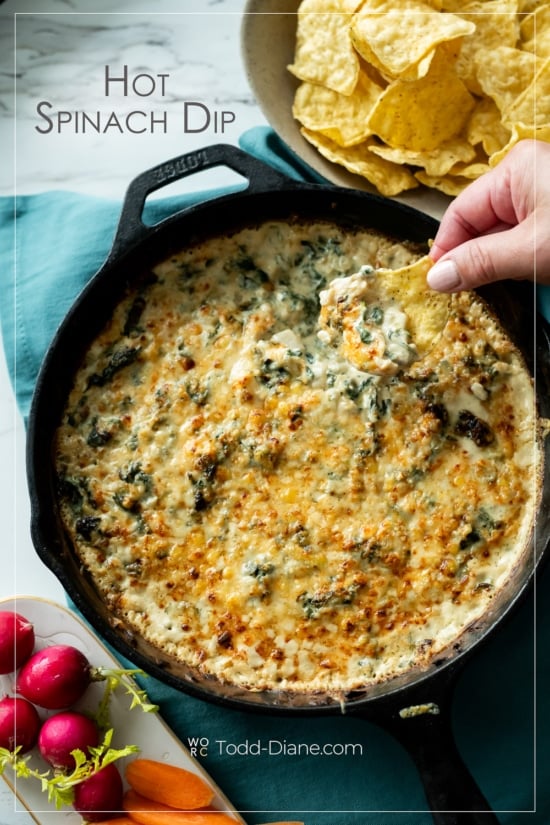 holding chip in hot stovetop spinach dip recipe