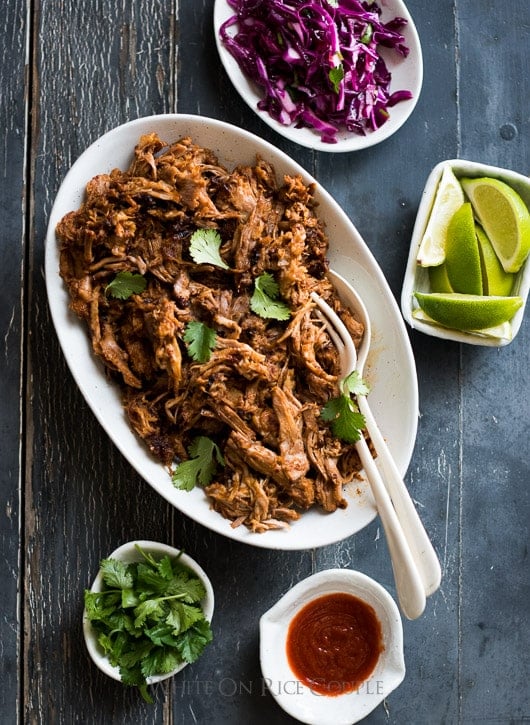 Sweet and Sriracha Spicy Oven Roast Pulled Pork in a serving bowl