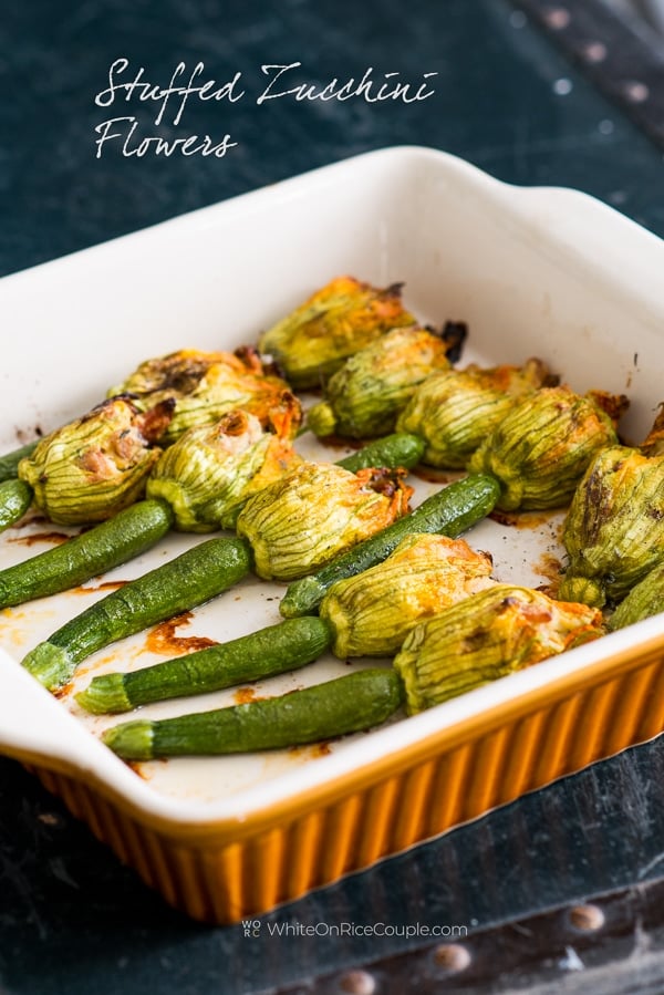 Stuffed Zucchini Flowers or squash blossoms in a baking dish