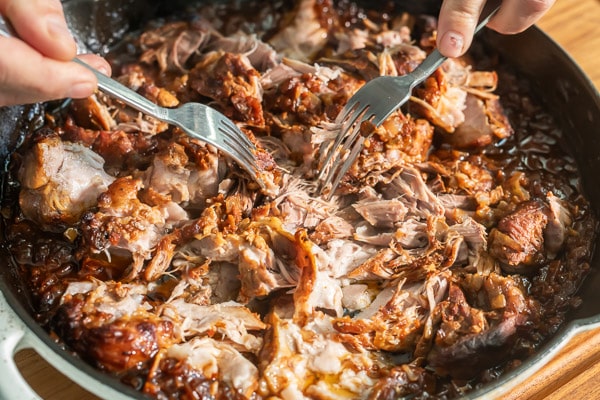 Shredding pork with 2 forks