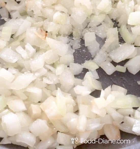 Raw onions in pan