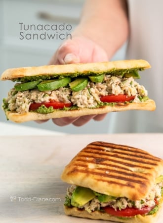 holding tunacado sandwich