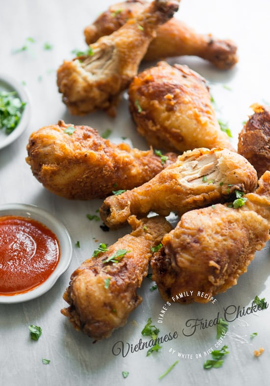 Crispy and flavorful Vietnamese Fried Chicken on a board close up