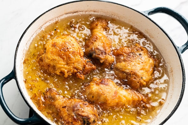 Chicken frying in oil
