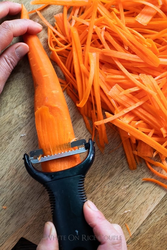 Shredding carrots for Vietnamese pickled carrots