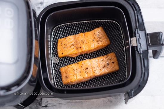 Air fried salt and pepper salmon in air fryer basket