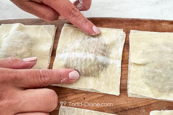 Pressing edges to seal