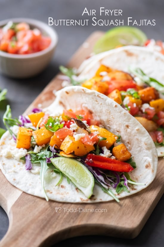 plate of tacos with air fryer butternut squash fajitas filling 