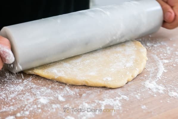 rolling out pie dough