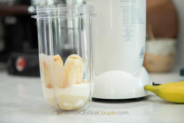 adding ingredients to personal blender