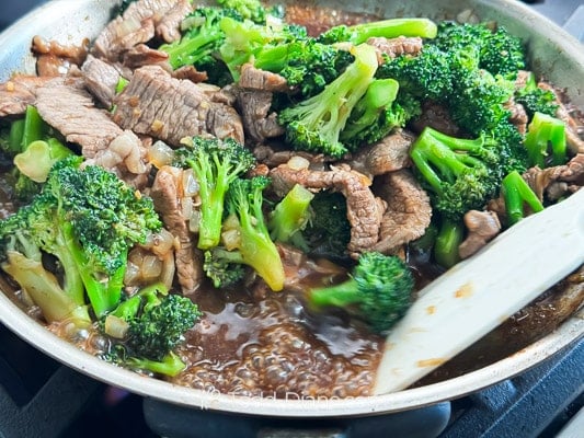 thickening the sauce in pan