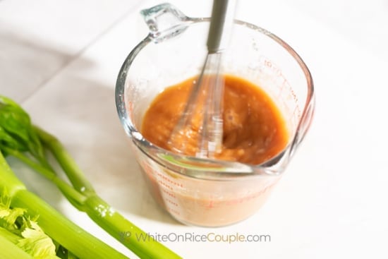 whisking sauce for beef and celery stir fry