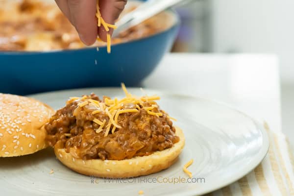 topping with cheese