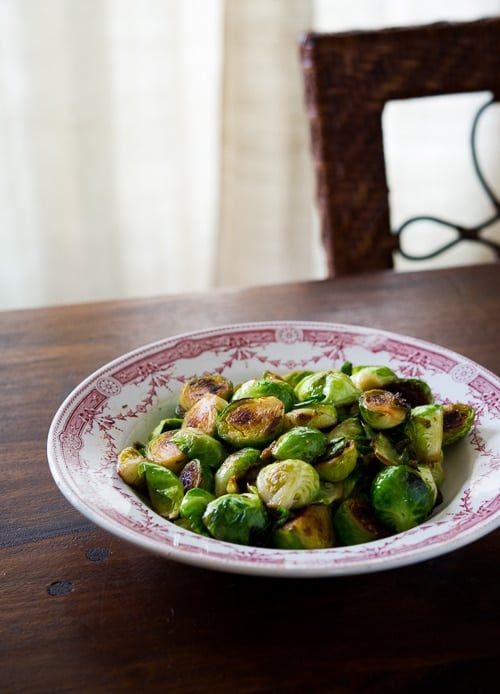 Pan Roasted Brussels Sprouts with Fish Sauce & Lime on a plate