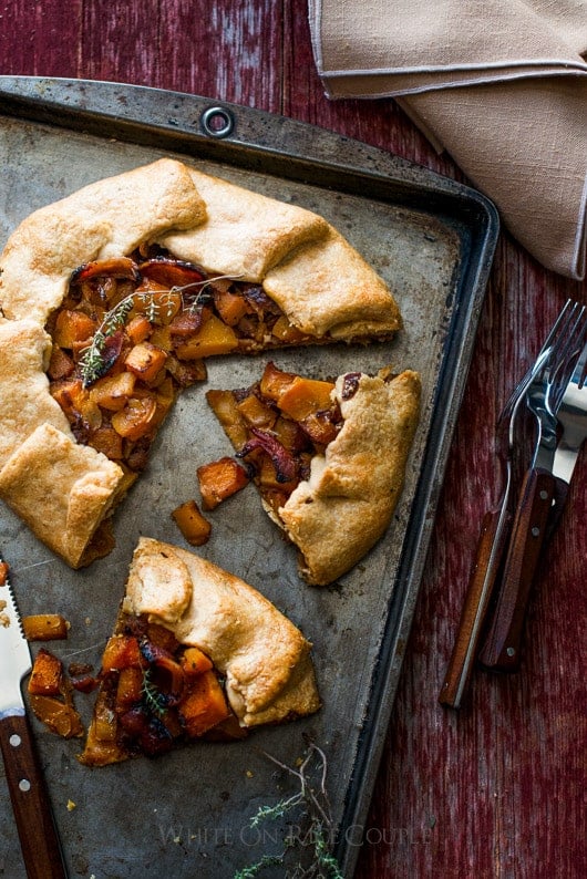 Butternut Squash and Bacon Galette on a baking sheet
