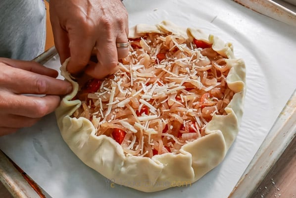 crimping edges of pie dough for galette