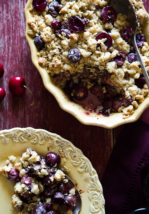 chocolate cherry crisp on a plate and in a bowl