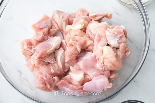 raw chicken cut into bite sized pieces