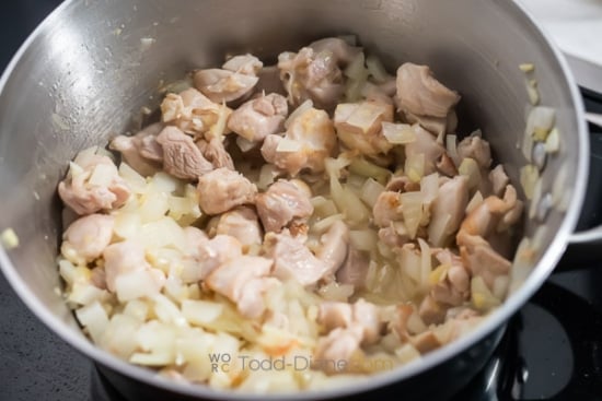 cooking onions and garlic with chicken