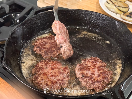 flipping burger patties