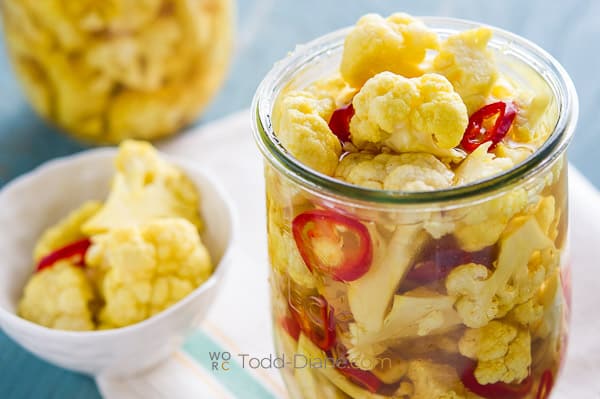 finished pickles in jar and bowl