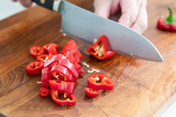slicing red jalapeno chiles