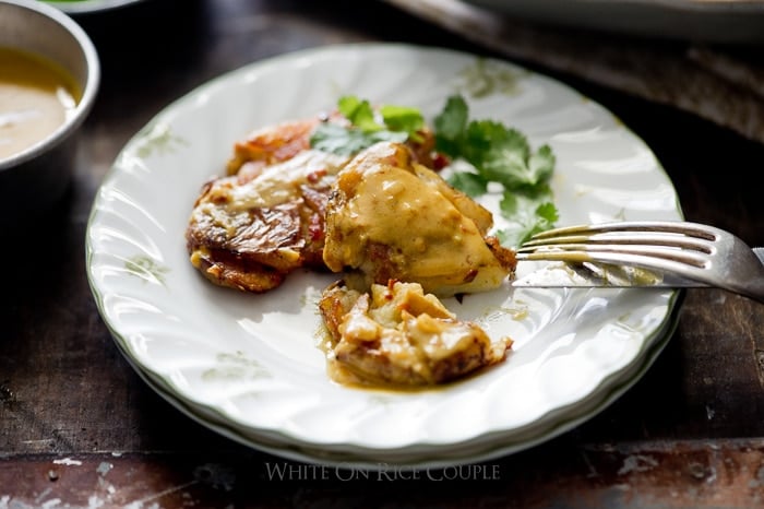 Smashed Potatoes with Thai Curry Sauce on a plate