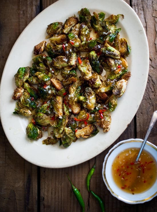 Fried Crispy Brussels Sprouts with Mom's Sweet Chili Fish Sauce Dip on a plate