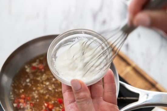 Whisking cornstarch slurry