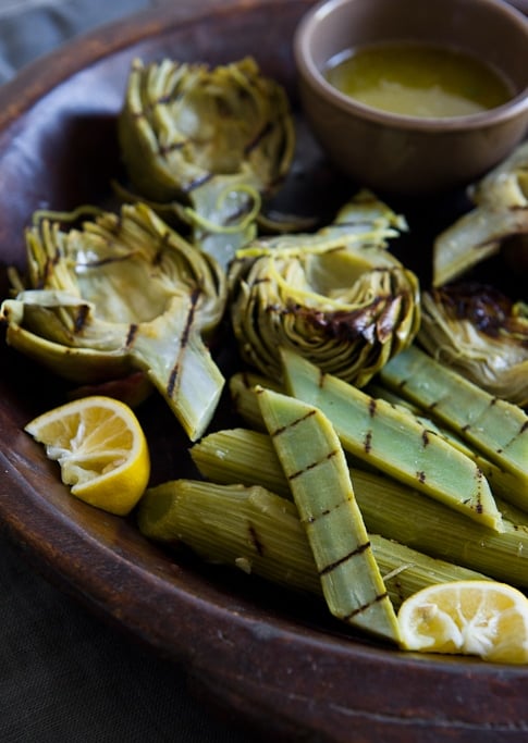 grilled artichoke hearts in bowl. 