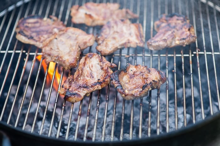 Grilled Pork Butt or Pork Shoulder Steaks on a grill