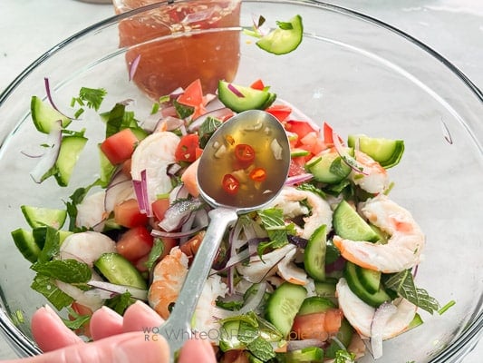 drizzling over salad