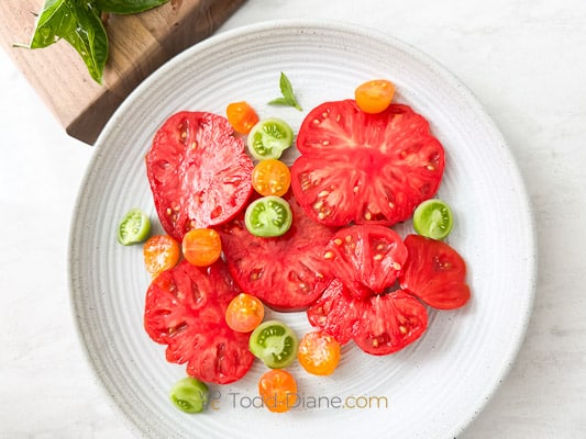 slices of tomato arranged on plate