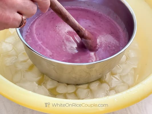 stirring curd in ice bath