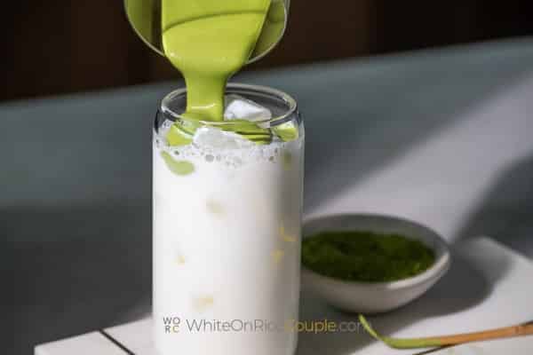 adding matcha cream to drink