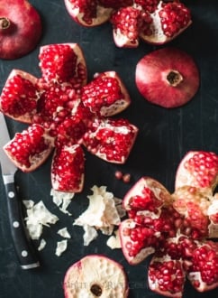 Cool way to shuck pomegranates without making it look like a murder scene | @whiteonrice