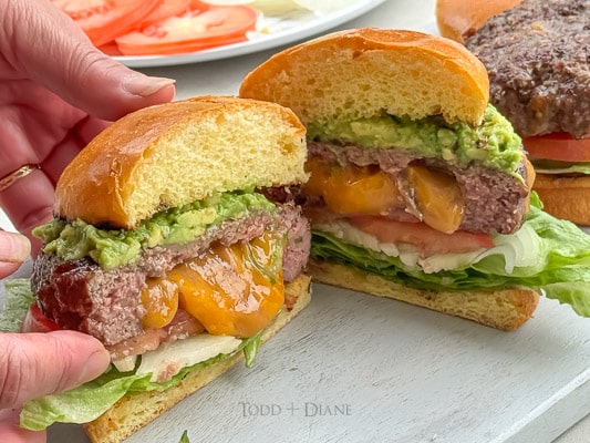 Stuffed jalapeno cheddar burger cut in half