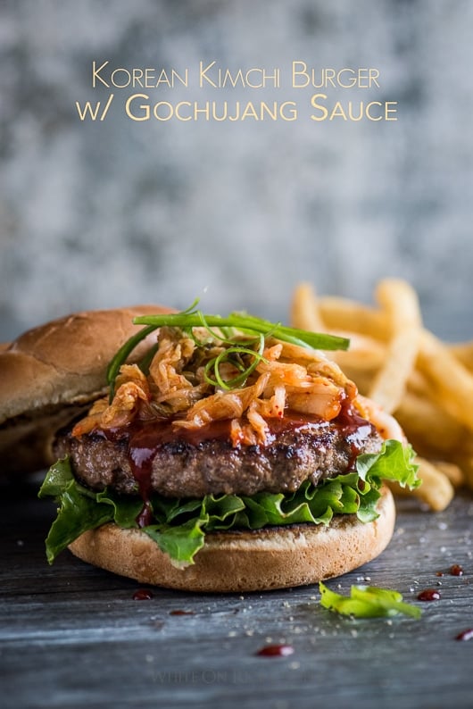 Korean Kimchi Burgers with Gochujang Sauce on a cutting board