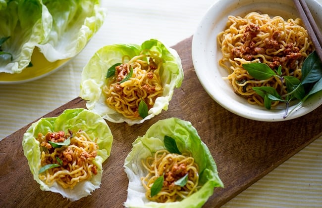 Spicy pork lettuce cups recipe or lettuce wraps on table