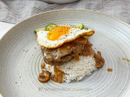 fried egg on top of loco moco meat