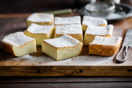 Magic Custard Cake Recipe on a cutting board close up