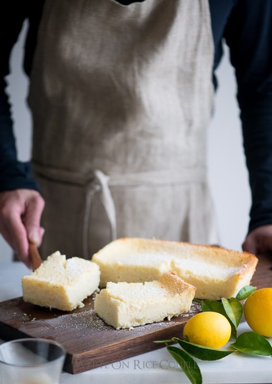 Meyer Lemon Magic Custard Cake on a cutting board